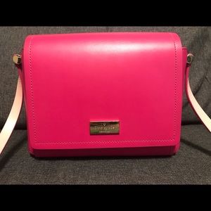 Hot pink Kate Spade purse.